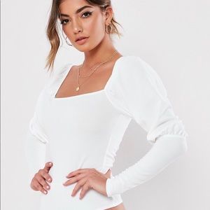 White puff long sleeve bodysuit